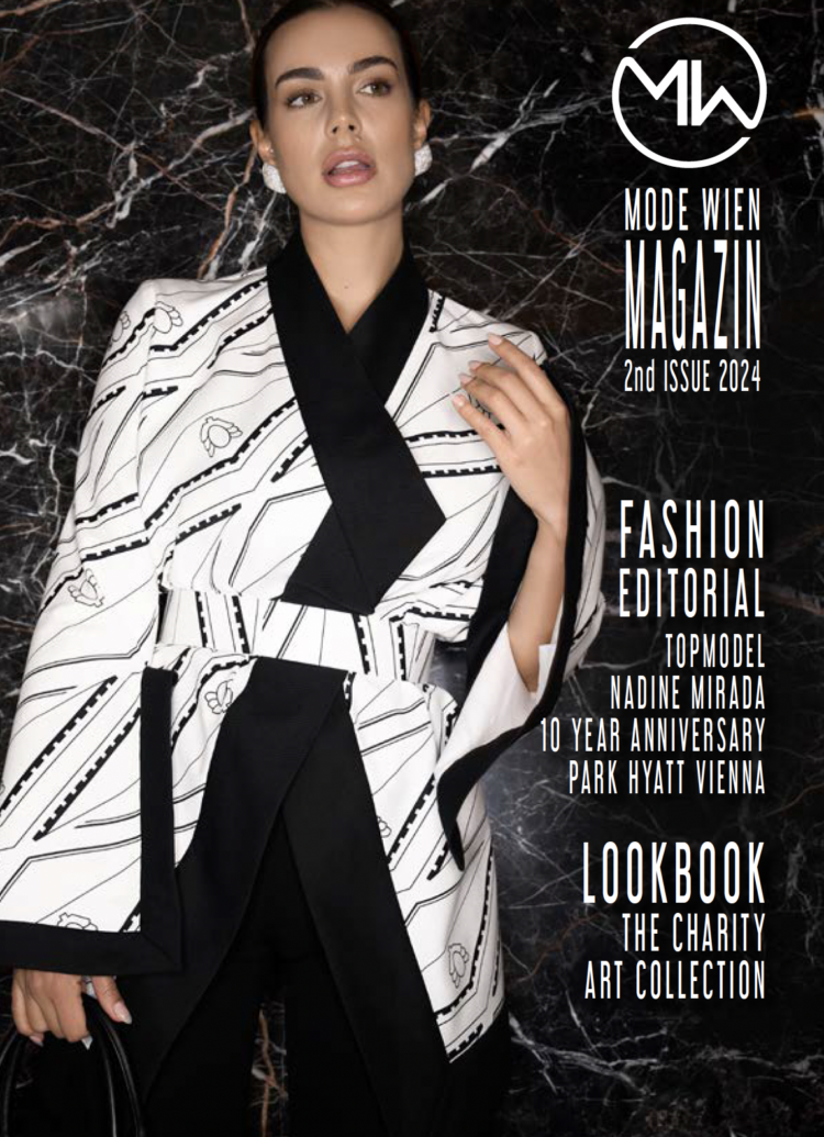Mode Wien Magazin 2nd Issue 2024 auf dem ein Model zu sehen ist das ein schwarz-weißen Blazer trägt und posiert.